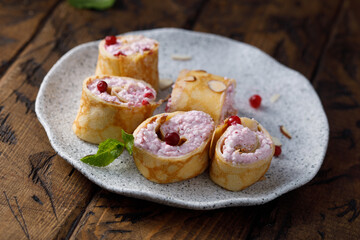 Pancakes with berries and cream cheese
