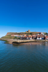 Whitby on North Yorkshire coast on clear sunny day
