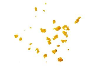 crispy fried flour crumbs flying on an isolated white background, for design, fried chicken. Fried popcorn chicken falling in the air isolated on white background.