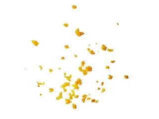 crispy fried flour crumbs flying on an isolated white background, for design, fried chicken. Fried popcorn chicken falling in the air isolated on white background.