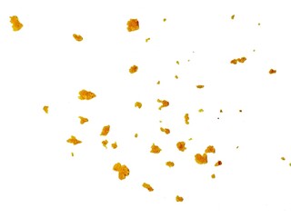 crispy fried flour crumbs flying on an isolated white background, for design, fried chicken. Fried popcorn chicken falling in the air isolated on white background.