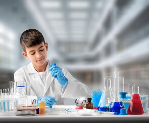 Little child make chemistry science experimental chemistry lessons.