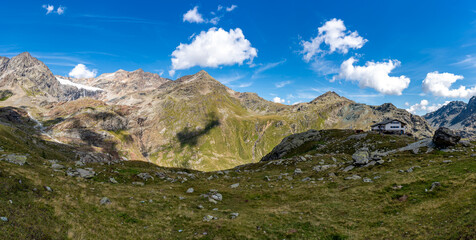 Panoramic view of Valmalenco, with the Fellaria Glacier, the Bignami Refuge, and the surrounding...
