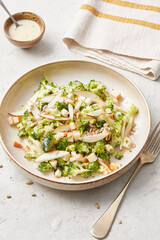 Raw salad with broccoli and apple