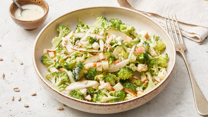 Raw salad with broccoli and apple