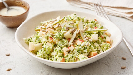 Raw salad with broccoli and apple