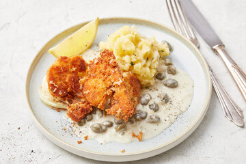 Potatoes with cauliflower and caper dressing