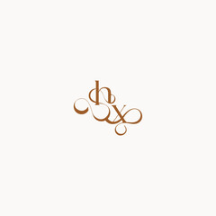 XH letter luxury minimalist logo design wedding initial concept caligraphic style monogram