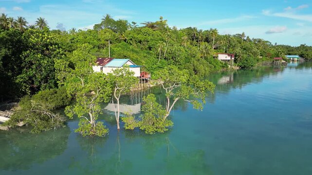 Maratua, Indonesia: Aerial drone footage of tree shot in orbit motion located in Maratua island, Derawan Archipelago in Borneo Indonesia