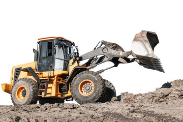 A heavy wheel loader or bulldozer is actively digging and moving dirt at a construction site, showing off its powerful front loader capabilities against an isolated background.