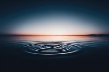 Water droplet impact, serene sunrise over still water