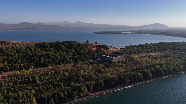 Aerial View of Lake Sevan Armenia &ndash; Mountains, Church, Waves, and Peninsula
