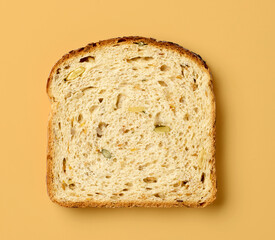 slice of bread on orange background