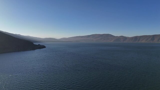 Aerial View of Lake Sevan Armenia &ndash; Mountains, Church, Waves, and Peninsula