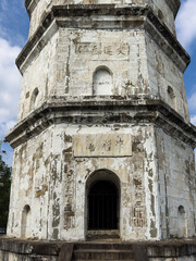Entrance of historical Laiyan Tower on Mount Yintai in Guangyuan, Sichuan, China, a stone octagonal tower with 36 meters height and 13 floors built in late Qing Dynasty. Heritage.