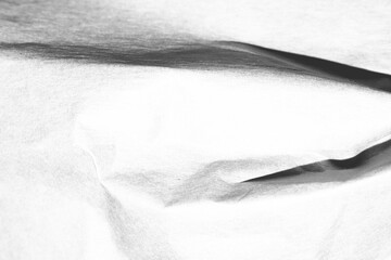 Abstract grunge black and white distressed texture torn crumpled paper overlay background