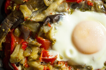 Cooked vegetables with poached egg