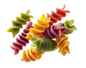Vibrant spiral pasta in shades of yellow, red, and green,  arranged in a cluster against a black background