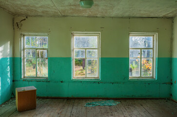 Sunlit Abandoned Room with Green Walls - the abandoned pioneer camp of the USSR