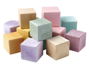 Pastel-colored wooden building blocks in various shades of light pastel colors, including beige, lavender, mint, and peach, arranged in a pile
