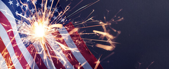 USA flag background with sparkler for Veterans Day, Memorial Day, Independence Day, and 4th of July...