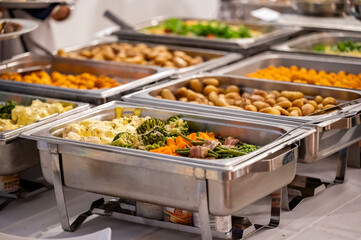 Hot Buffet with Vegetables and Potatoes