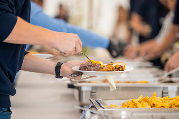 Catering Buffet with French Fries and Meat