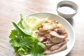 fried beef meat brisket with fresh vegetable on plate dipping Thai spicy sauce 
