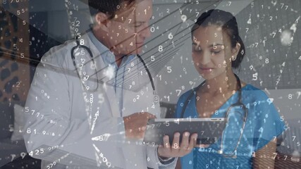 Animation of data processing over caucasian doctors using tablet - Powered by Adobe