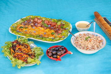 Festive traditional dishes on bright cloth