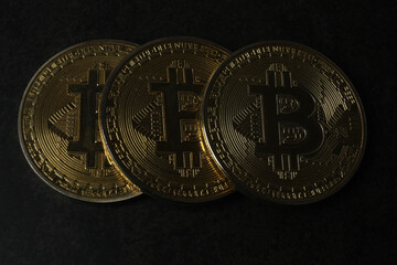 bitcoin gold, money on black background
