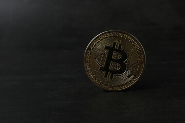 bitcoin gold, money on black background
