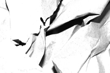 Abstract grunge black and white distressed texture torn crumpled paper overlay background