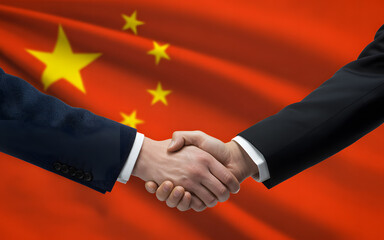 Business handshake with Chinese flag background, symbolizing international partnership and agreement for global trade