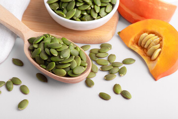 Green pumpkin seeds. Raw organic pumpkin seeds without shells. Healthy Superfood Rich in Protein, Vitamins and Minerals.