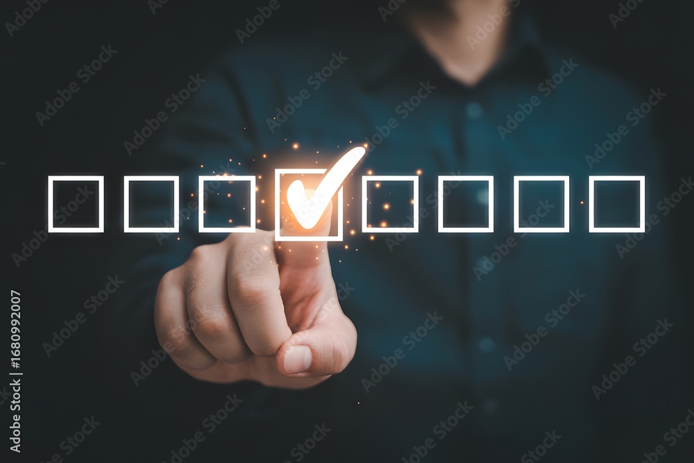 Poster a finger selecting a glowing check mark inside a square box in a digital interface display panel
