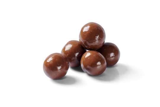 Pile of round chocolate covered nougat cream filled waffle balls candy sweet