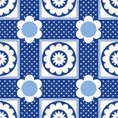 Blue white seamless background with flowers.
Abstract, repeating regular pattern for print.
Graphic design with regular shapes.