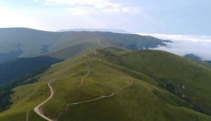 Naklejka premium Rolling hills and winding roads