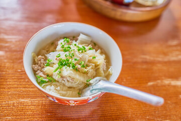 Rice porridge with cabbage and minced pork, breakfast