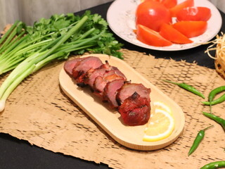 Honey roasted red pork, tender and juicy with a glossy sweet glaze, a delicious Asian-style dish served as a savory and aromatic delicacy.