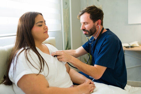 Medical professional visiting patient at home after surgery for post-operative care