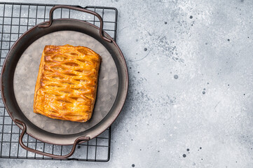 Danish pastry with a lemon jam, Puff pastry. grey background. top view