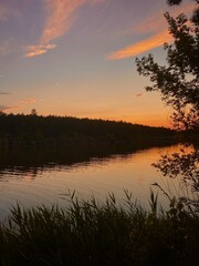 Naklejka premium sunset over the river