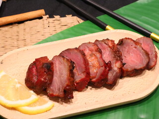 Honey roasted red pork, tender and juicy with a glossy sweet glaze, a delicious Asian-style dish served as a savory and aromatic delicacy.