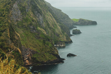 Breathtaking view of the wavy Atlantic ocean from the cliff in Azores islands Portugal