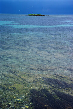 sea and sky, The waters of the islet cove, at the entrance to Stintino. Sassari, Sardinia, Italy