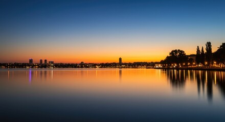 Fototapeta premium City Lake Sunset Reflection Peaceful Urban Landscape