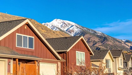 Row of houses against a mountain backdrop