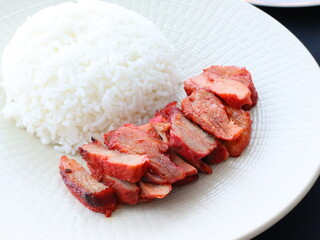 Honey roasted red pork, tender and juicy with a glossy sweet glaze, a delicious Asian-style dish served as a savory and aromatic delicacy.